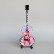 Minature Guitar on Stand Taylor Swift 24x8x1cm