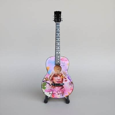 Minature Guitar on Stand Taylor Swift 24x8x1cm